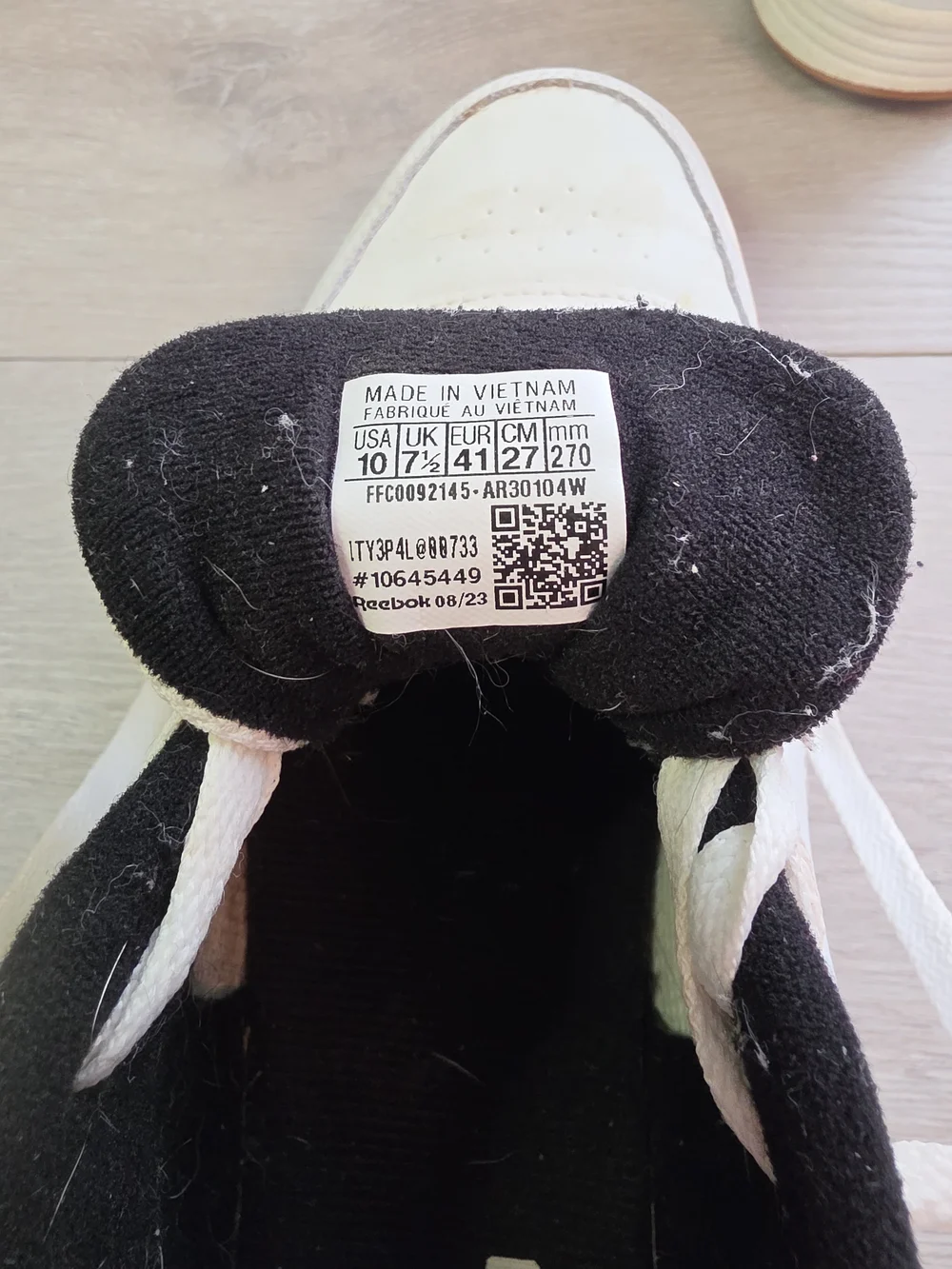 Reebok Womens  Classic White & Black Leather Sneakers